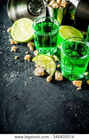 Three Shot Glasses With Absinthe