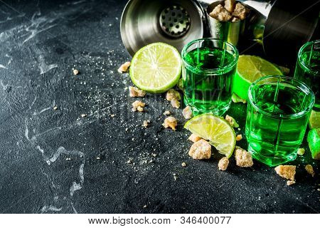 Three Shot Glasses With Absinthe