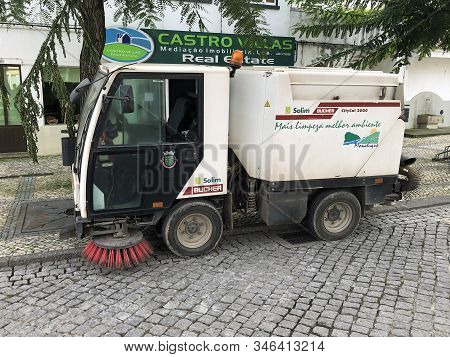 Albufeira, Portugal - December 26, 2019: White Bucher Citycat 2000 Sweeper Parked By The Side Of The