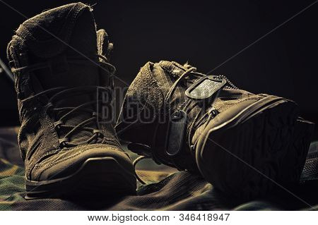 Military Boots. The Concept Of War, Veterans, Fallen Fighters. Sale Of Military Shoes.