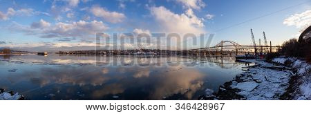 Beautiful Panoramic View Of Fraser River And Pattullo Bridge In The City During A Cold And Icy Winte