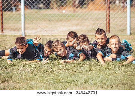 Soccer Drills: The Slalom Drill. Youth Soccer Practice Drills. Young Football Player Training On Pit