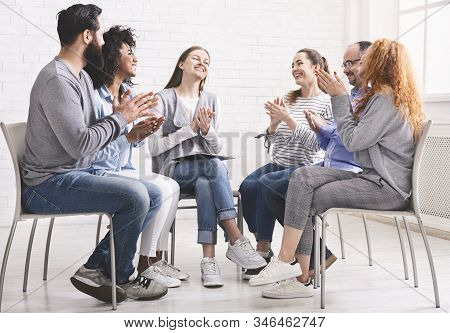 Successful Rehabilitation. Group Of Happy People Applauding To Themselves At Therapy Session, Celebr