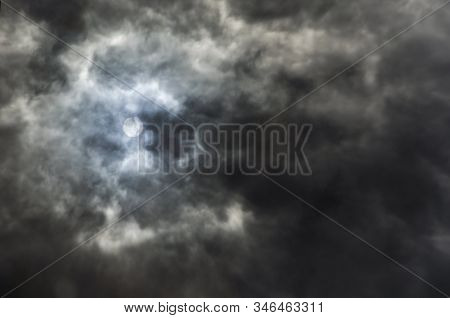 Strange Reflection Of A Stormy Sky, Dark Clouds Filling The Frame
