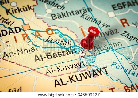 Prague, Czech Republic - January 12, 2019: Red Thumbtack In A Map. Pushpin Pointing At Basra City In