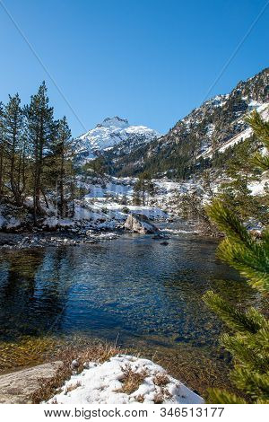 Small River In The Snowy Pyrenees Mountains, Near Pont Espagne