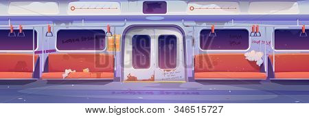 Metro In Getto, Empty Subway Tube Wagon Interior With Graffiti, Broken Seats And Garbage Around. Old