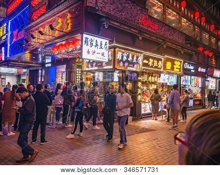 Changsha/china-17 October 2018:unacquainted People Walking On Huangxing Walking Street In Changsha C