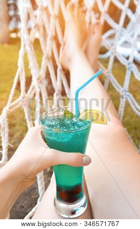 Fresh Cocktail With Strow In Female Hand.
