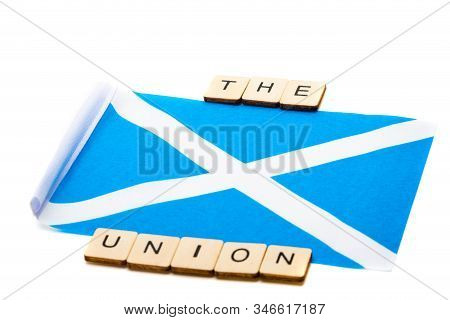 The National Flag Of Scotland, The Saltaire Or Cross Of St Andrews On A White Background With A Sign