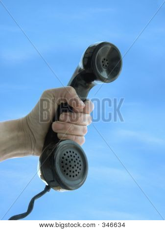 Mão e telefone