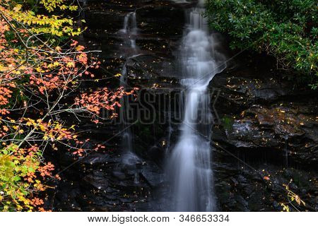 Refreshing Waterfall Hidden Deep In The Autumn Forest