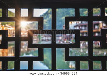 Defocused View From The Terrace And Balcony Of The Old Historic Stilt Wooden Diaojiao Houses On The 