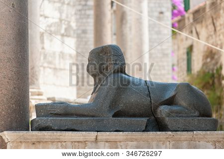 Close Up Of Black Granite Egyptian Sphinx Sitting On Peristyle, Central Square Of The Diocletian Pal