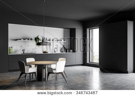 Gray Kitchen Corner With Cupboard And Table