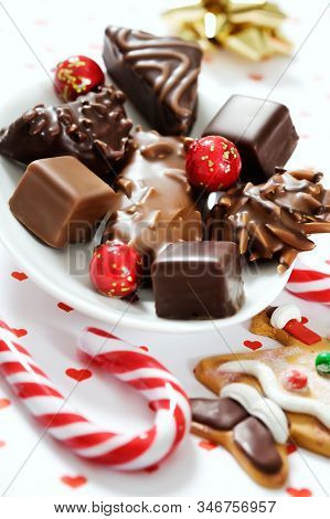 A Mixture Of Delicious Gingerbread Assortments Covered In Chocolate