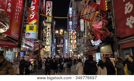Osaka, Japan- 01 Dec, 2019: Tourists Walking Around Pedestrian Walking Street At Dotonbori Arcade Un