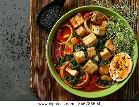 Tasty Soup With Tofu Cheese In Bowl On Table