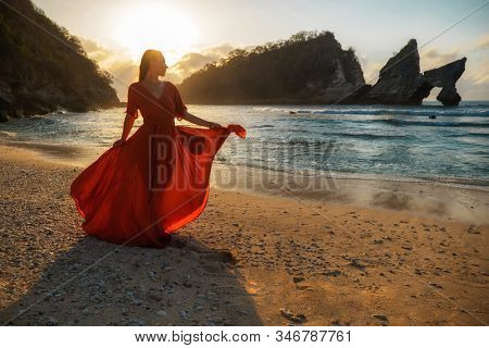 Woman at Atuh beach at Nusa Penida Island, Bali, Indonesia