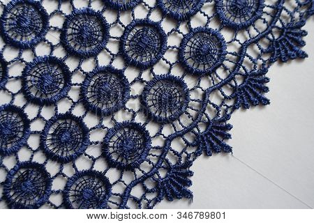 Deep Blue Crochet Lace Edge On Neutral Background
