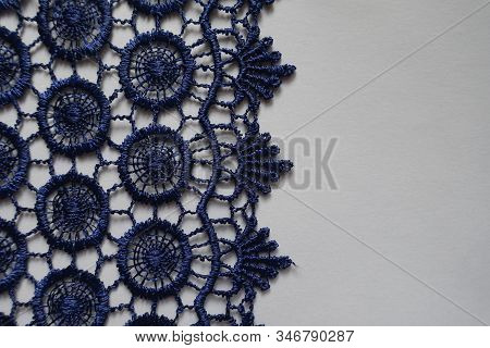 Navy Blue Crochet Lace Edge On Neutral Background