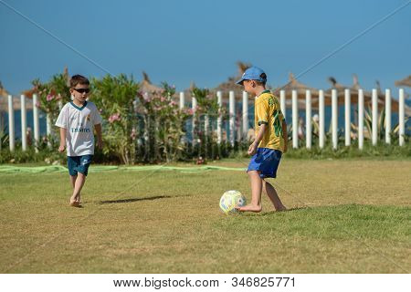 10 Th June, 2018, Sousse, Tunisia. Boys Playing Football On A Green Hotel Field During Their Summer 