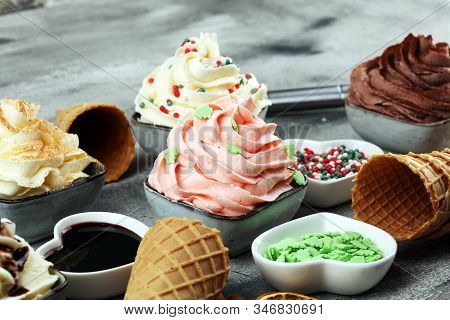 Soft Ice Cream In Flavor Vanilla, Chocolate And Strawberry. Delicous Creamy Refreshing Ice Cream
