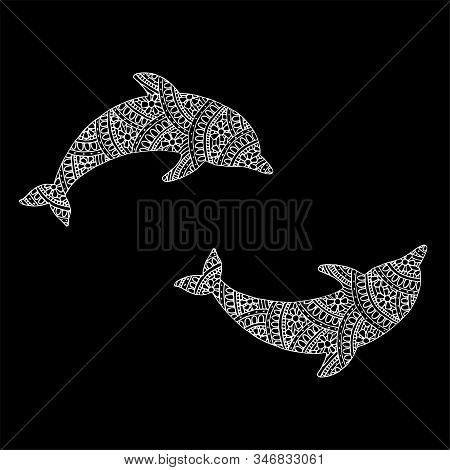 Two White Silhouettes Of Dolphins With Patterns. Vector Illustration With Black Background.
