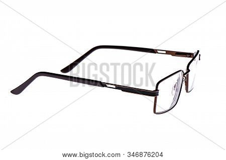 Glasses In A Metal Frame Isolated On A White Background. Glasses With Plastic Earhooks. Copy Space.