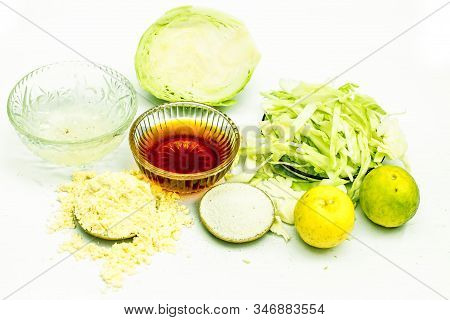 Close Up Of Cabbage Face Mask Isolated On White. Horizontal Shot Of A Bowl With Some Cabbage Paste W