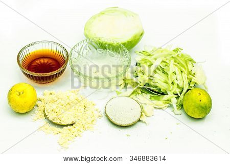 Close Up Of Cabbage Face Mask Isolated On White. Horizontal Shot Of A Bowl With Some Cabbage Paste W