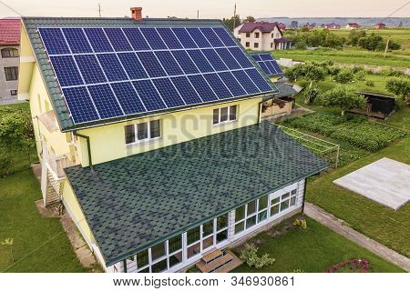 Aerial Top View Of New Modern Residential House Cottage With Blue Shiny Solar Photo Voltaic Panels S