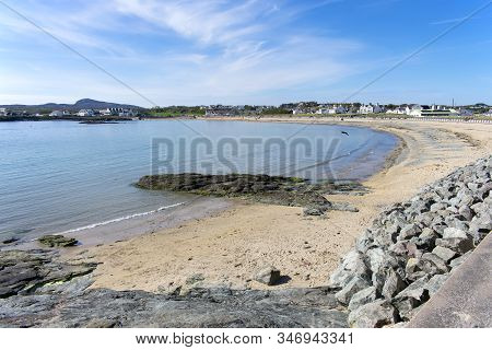 Anglesey, Wales, Beautiful Trearddur Bay. Landscape With Curve Of The Sandy Beach. Blue Sky On A Sun