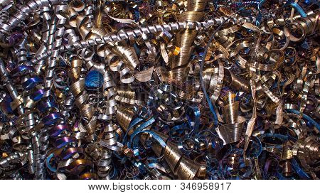 Abstract Color Background Of Metal Shavings. Processing Of Ferrous And Non-ferrous Metals In A Facto
