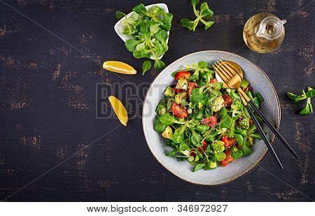 Fresh Salad Tomato, Avocado, Corn Salad And Chia Seed. Healthy Food Concept. Vegetarian / Vegan Cuis