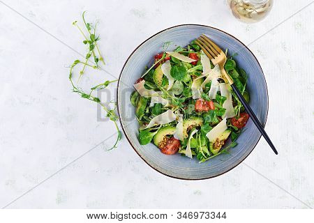 Healthy Salad Of Fresh Vegetables - Tomatoes, Avocado, Corn Salad, Pea Sprouts And Chia Seeds In Bow