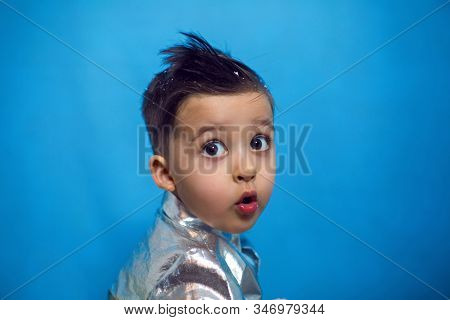 Child A Boy Of Three Years Old With A Fashionable Hairstyle