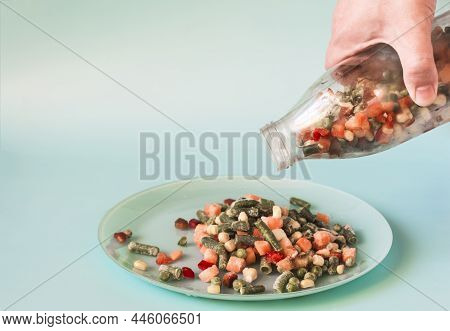 The Concept Of Using Quick-frozen Vegetables A Hand Holding A Bottle With A Mixture Of Frozen Vegeta