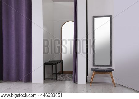 Empty Dressing Room In Fashion Store. Stylish Interior