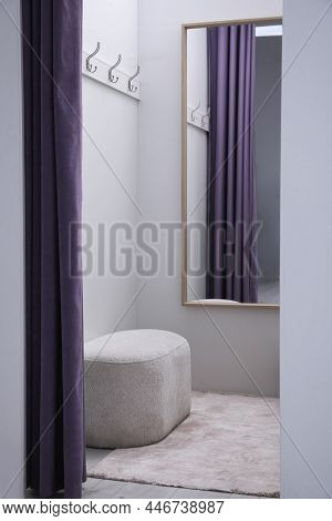Empty Dressing Room In Fashion Store. Stylish Interior