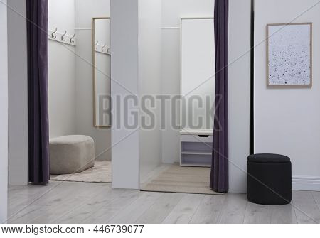 Empty Dressing Rooms In Fashion Store. Stylish Interior