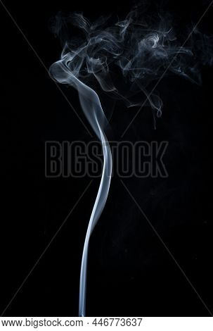 White Smoke On A Black Background. Isolated.