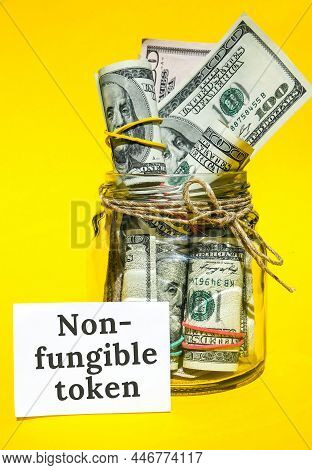 Nft Non-fungible Token Text. Concept Words Nft Non-fungible Token On Paper Blank. Background Of Doll