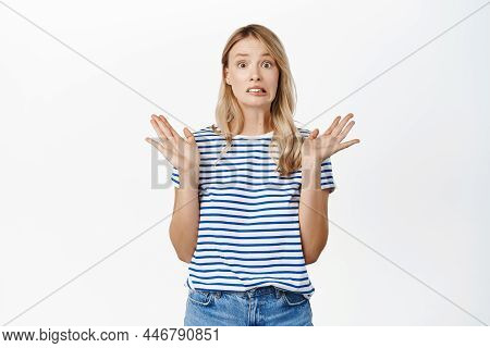Awkward Cute Girl Raising Hands And Shrugging, Making Anxious Smiling Face, Dont Know, Being Clueles