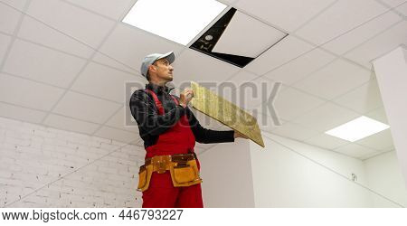 Builder Replacing Ceiling Panel, Working, Ceiling Armstrong
