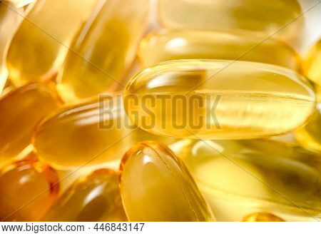 Close-up Texture Of Many Omega 3 Capsules. Polyunsaturated Fatty Acids. The Concept Of A Healthy Lif