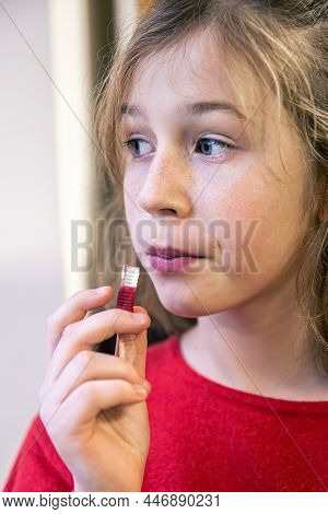Close Up, Little Girl Eating Gummy Candy.