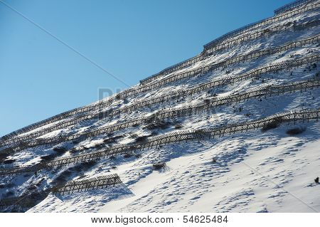Snowy Slope With Protection From Avalanches