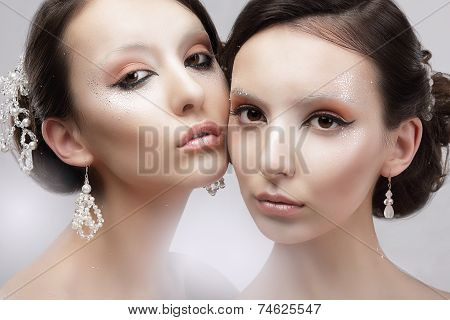 Glamour. Portrait Of Two Women With Shiny Glossy Makeup
