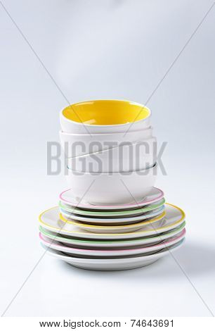 stacked soup bowls, dessert plates and lunch plates